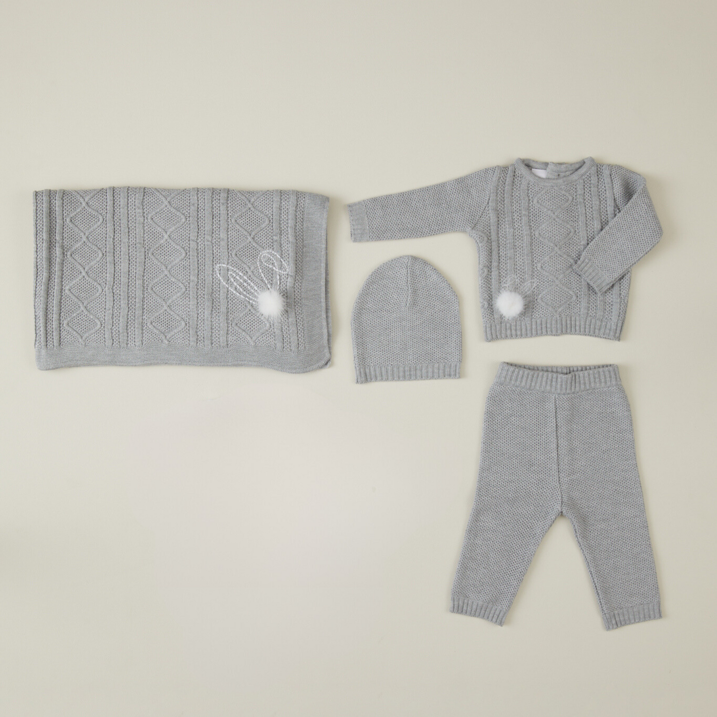 Conjunto tejido rombos gris con cobija